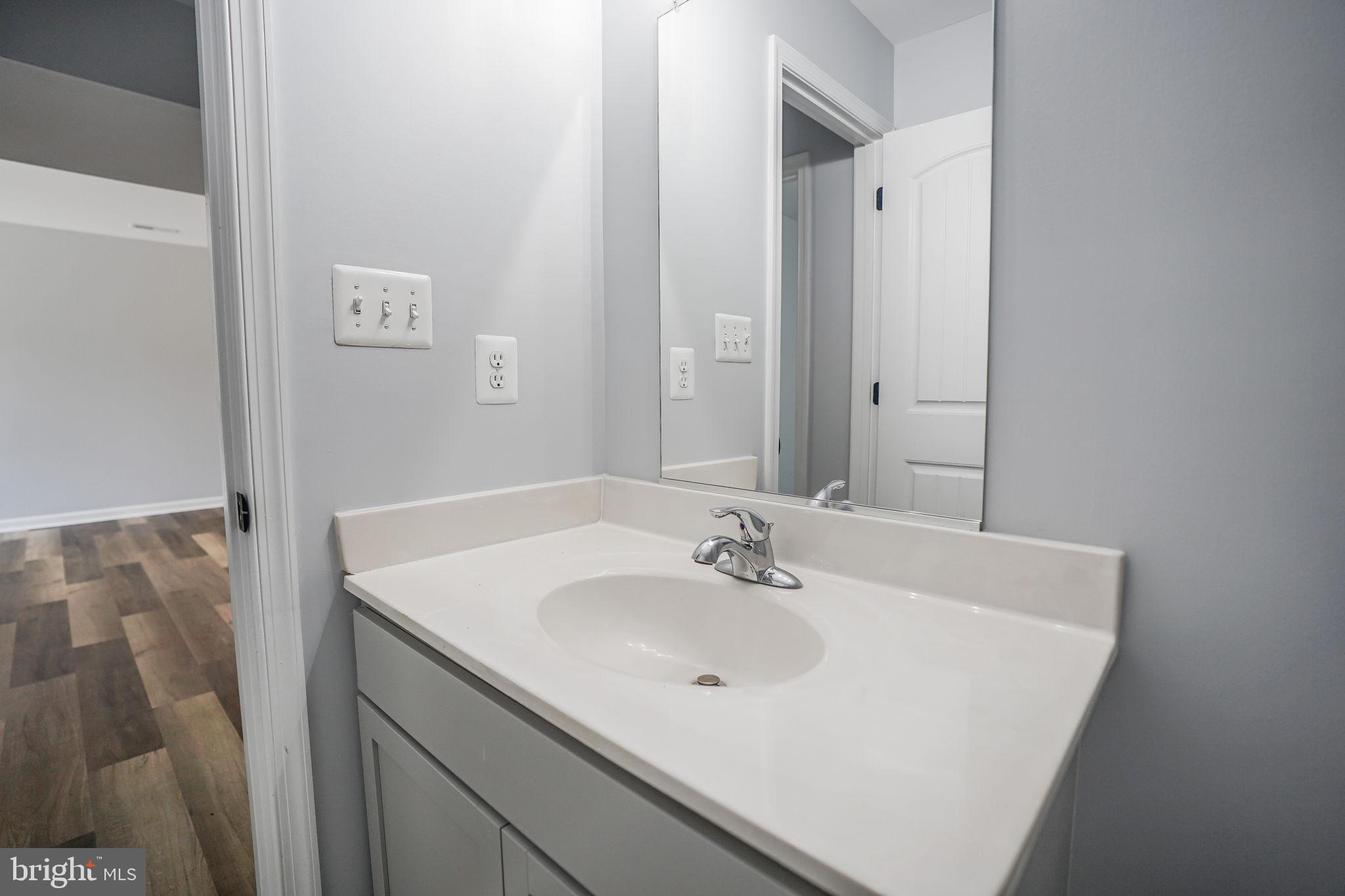 115 Meadow Road Pasadena, MD 21122 - Photo 59 of 77 Lower Level Bath New Vanity