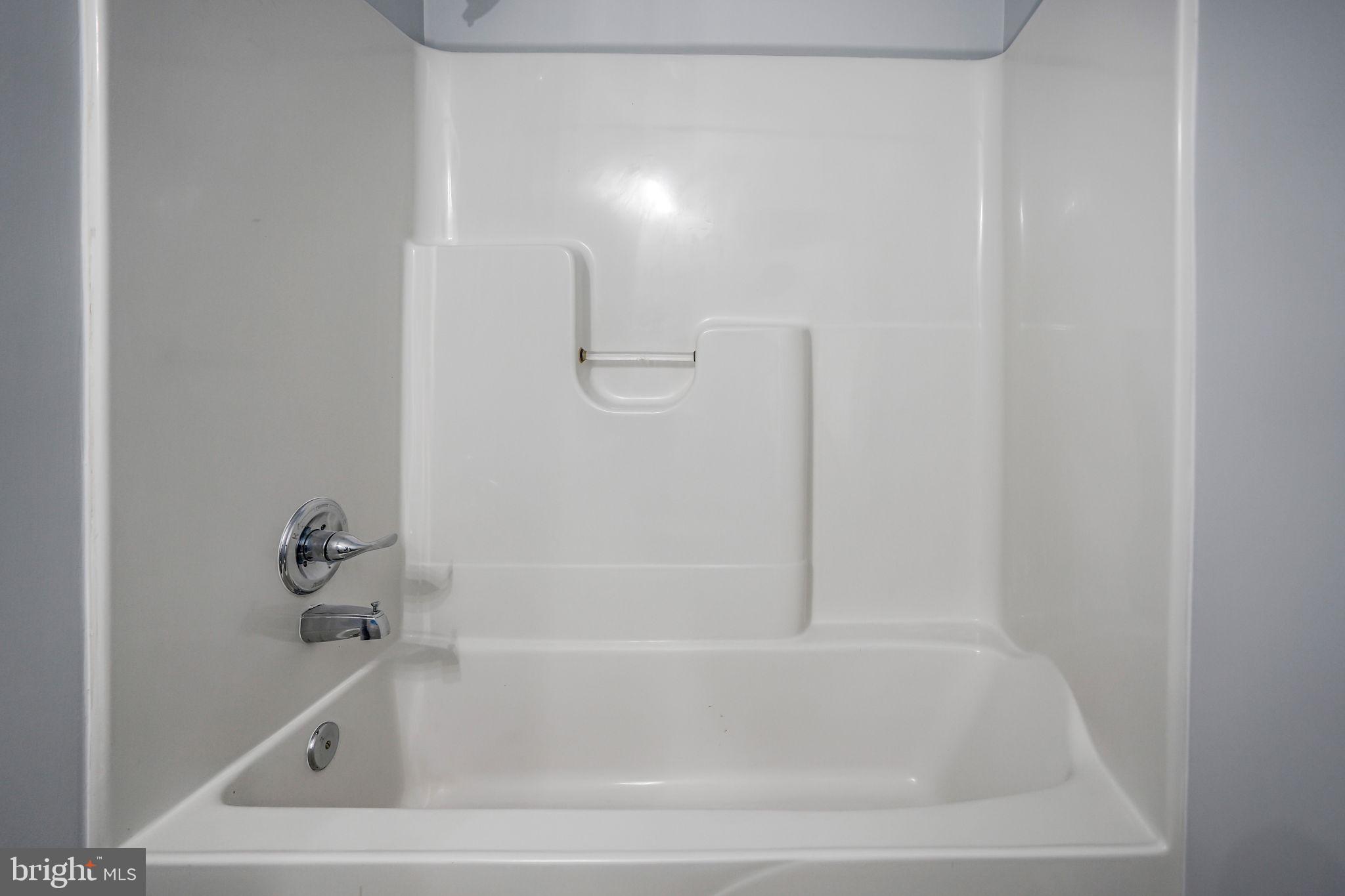 115 Meadow Road Pasadena, MD 21122 - Photo 60 of 77 Lower level Bath Tub & Shower