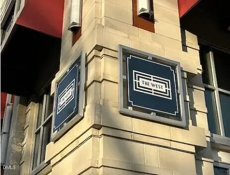 a front view of a building with a street