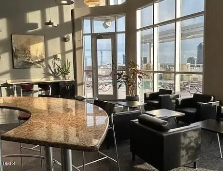 a view of a patio with swimming pool table and chairs
