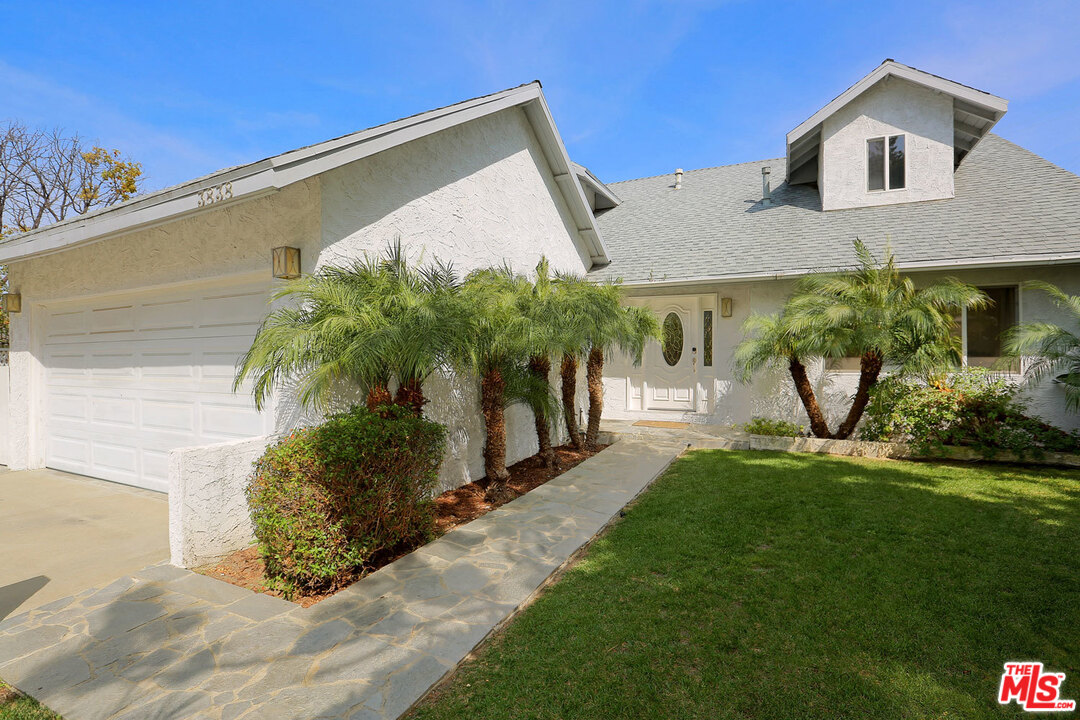 3838 Crestview Road Culver City, CA 90232 - Photo 2 of 29 a front view of a house with garden