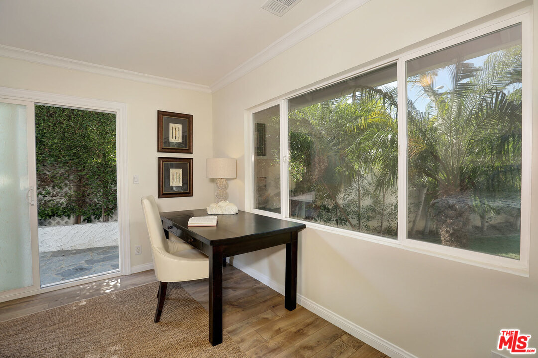3838 Crestview Road Culver City, CA 90232 - Photo 19 of 29 a view of a room with a table and chairs