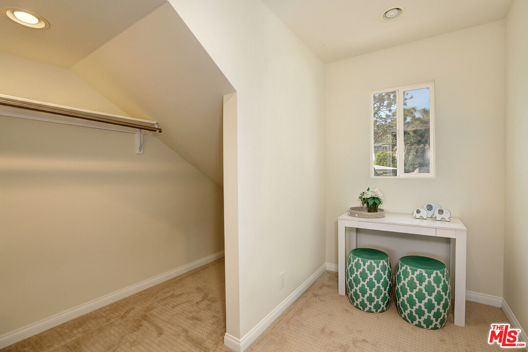 3838 Crestview Road Culver City, CA 90232 - Photo 21 of 29 a bathroom with a sink and a mirror