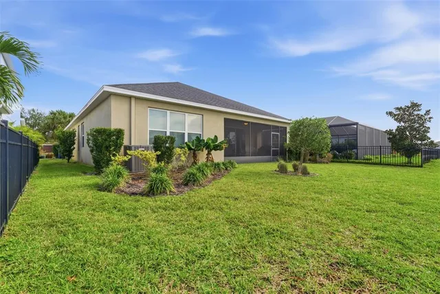 an aerial view of a house with a garden