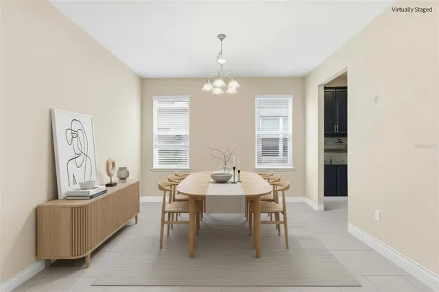 a large kitchen with kitchen island granite countertop wooden cabinets a counter top space and stainless steel appliances