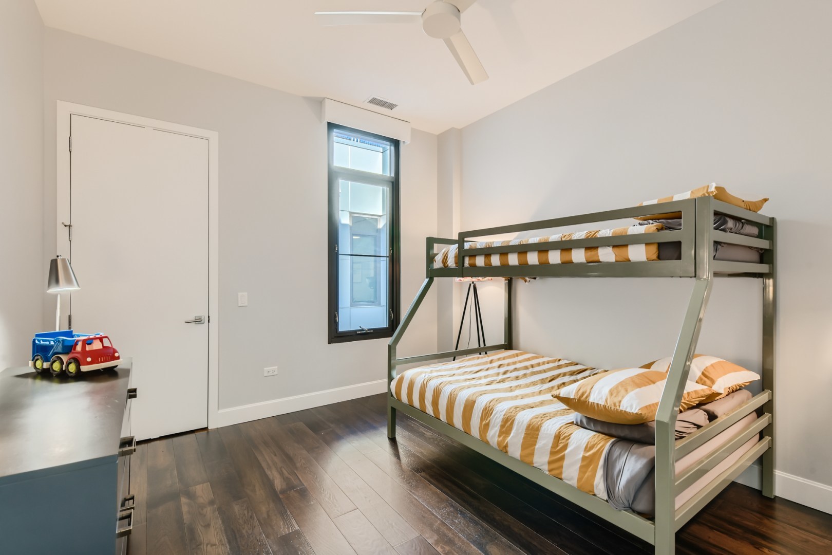 31 North Aberdeen Street, Unit PHS Chicago, IL 60607 - Photo 16 of 28 a bedroom with a bed and wooden floor