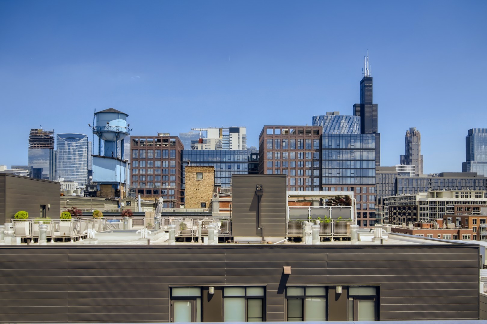 31 North Aberdeen Street, Unit PHS Chicago, IL 60607 - Photo 27 of 28 a city view with tall buildings