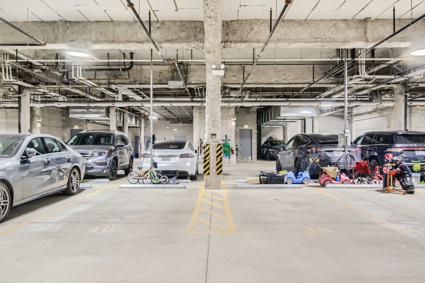 31 North Aberdeen Street, Unit PHS Chicago, IL 60607 - Photo 28 of 28 a view of parking garage with cars