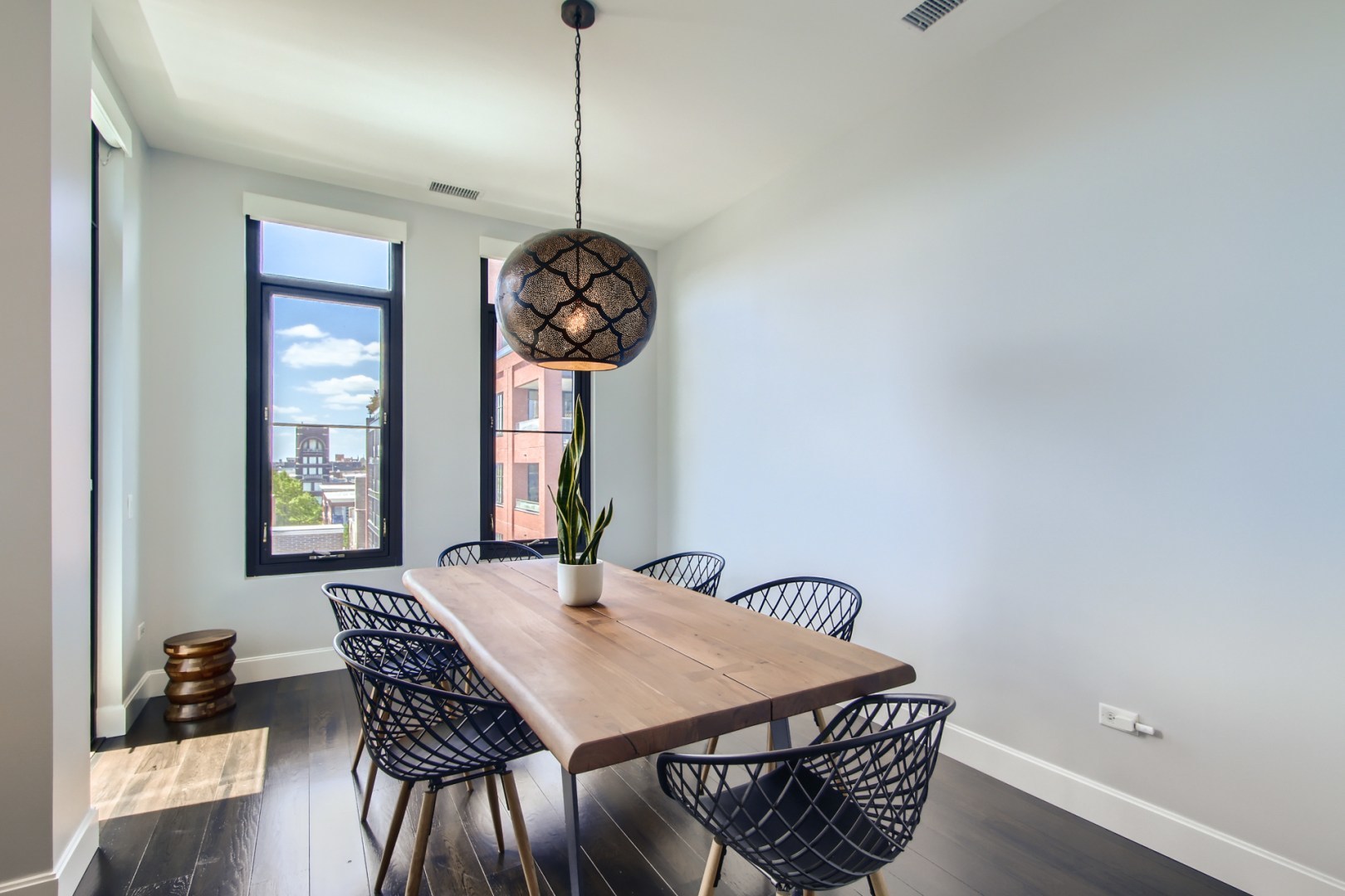 31 North Aberdeen Street, Unit PHS Chicago, IL 60607 - Photo 7 of 28 a view of a dining room with furniture window and wooden floor
