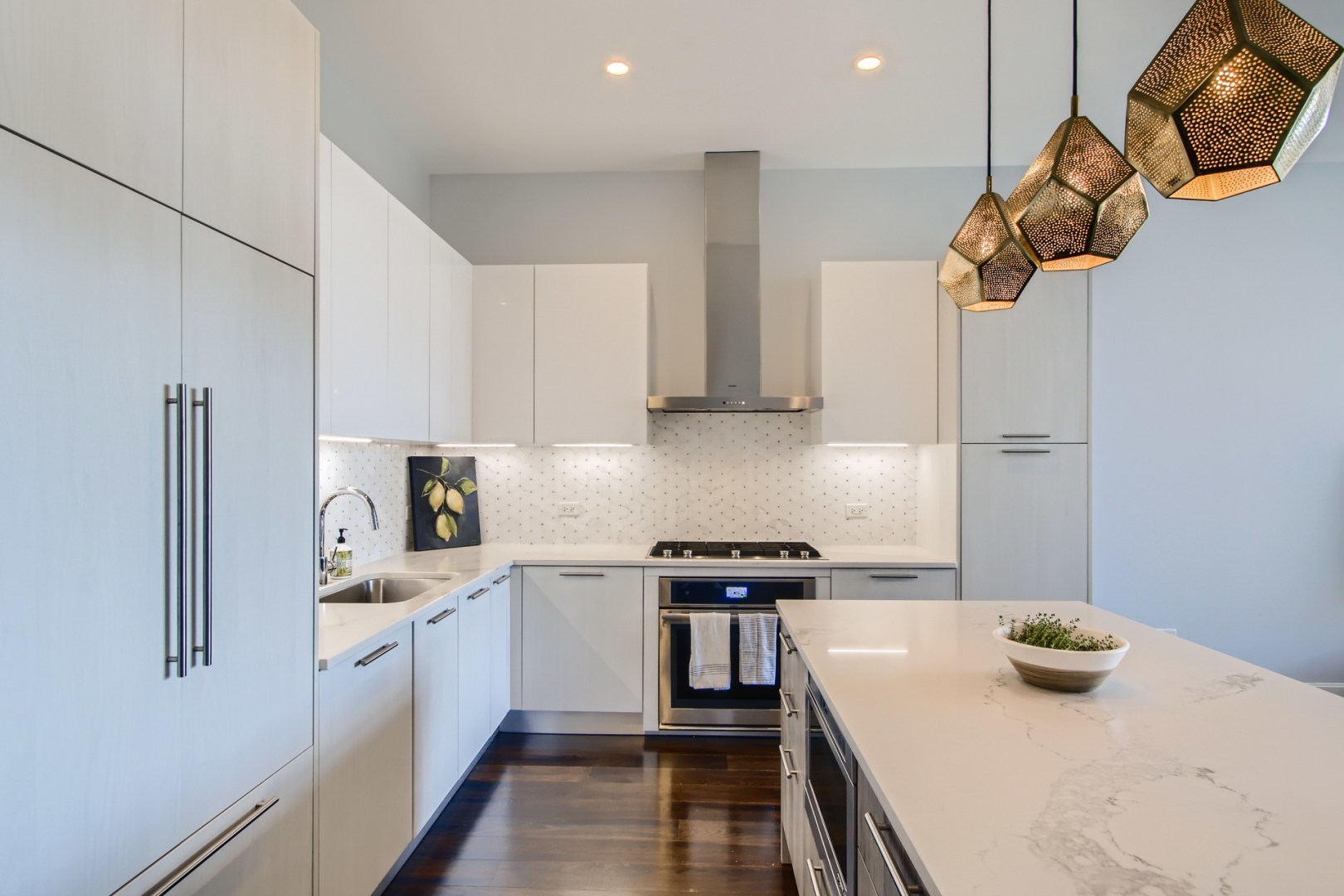 31 North Aberdeen Street, Unit PHS Chicago, IL 60607 - Photo 9 of 28 a kitchen with a sink appliances and cabinets