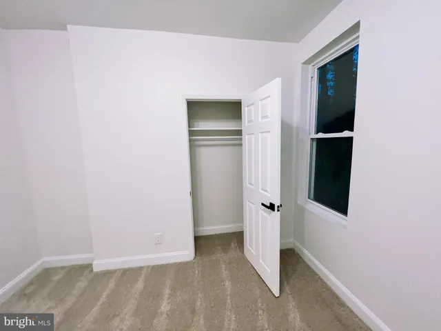 an empty room with closet