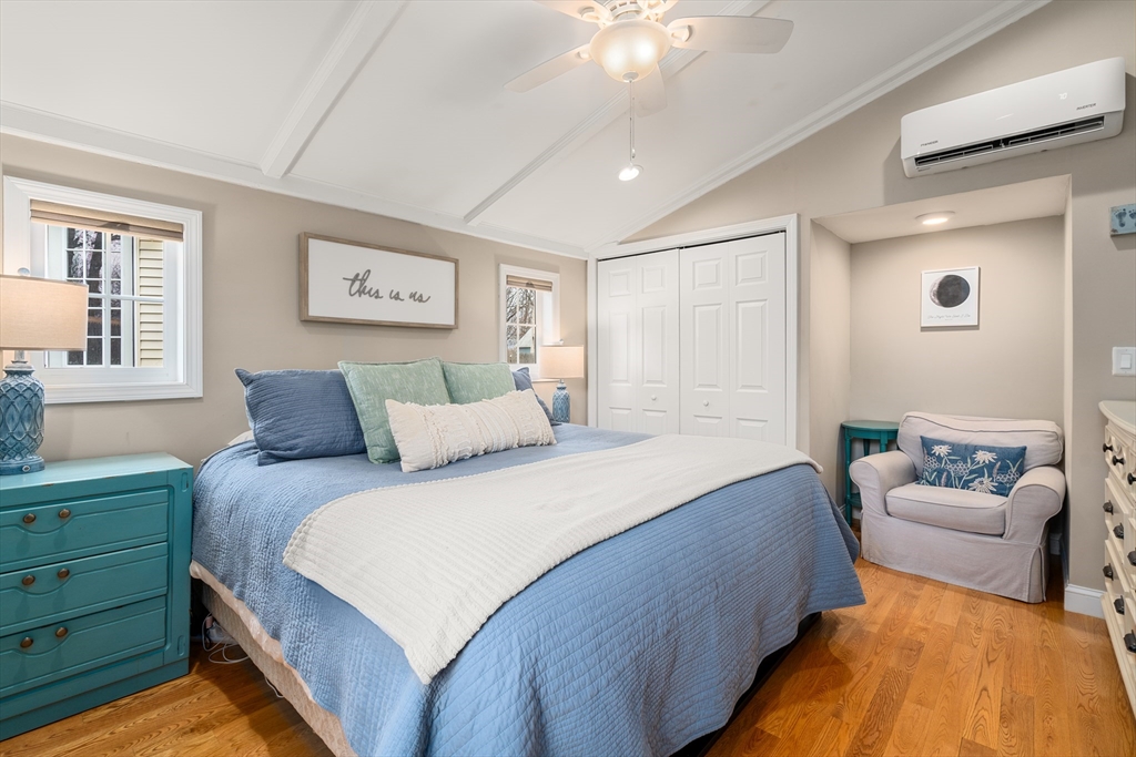 10 Cedar Street Hudson, MA 01749 - Photo 12 of 38 a bedroom with a bed and a couch