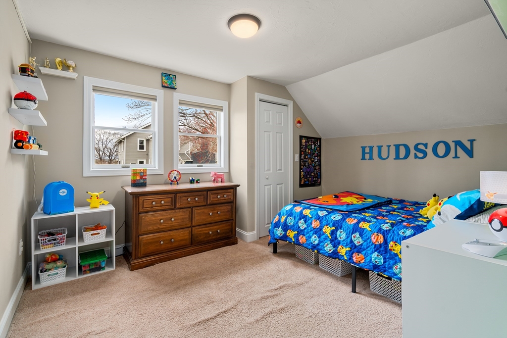 10 Cedar Street Hudson, MA 01749 - Photo 16 of 38 a bedroom with a bed and a window