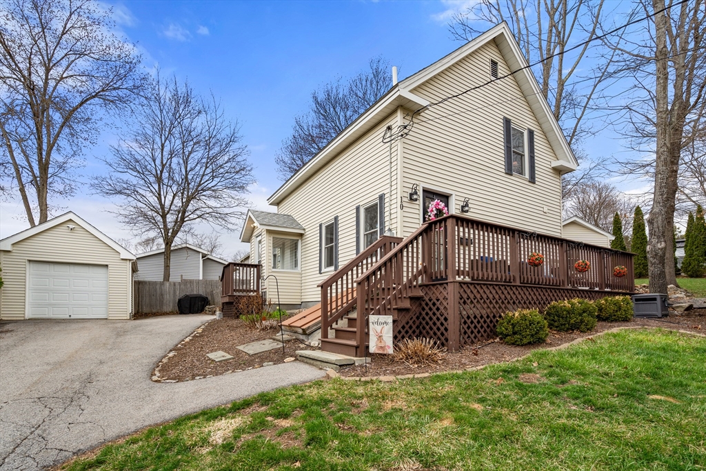 10 Cedar Street Hudson, MA 01749 - Photo 26 of 38 a view of a house with a yard