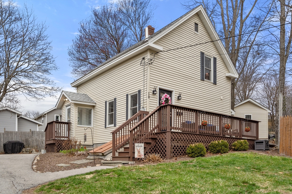 10 Cedar Street Hudson, MA 01749 - Photo 38 of 38 a view of a house with a yard