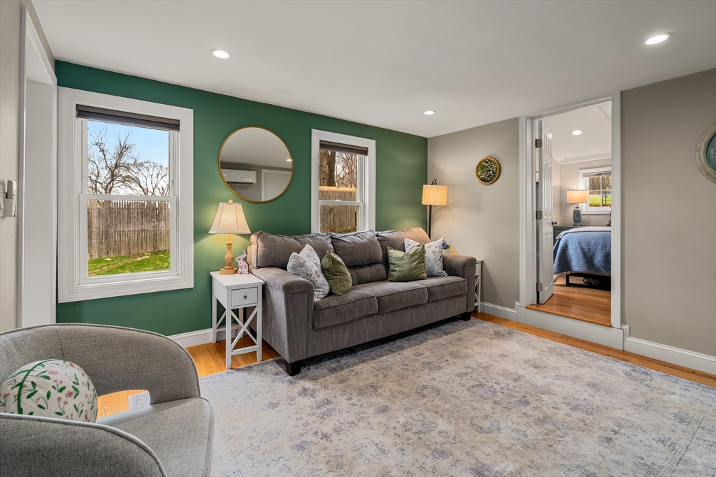 10 Cedar Street Hudson, MA 01749 - Photo 8 of 38 a living room with furniture and a window