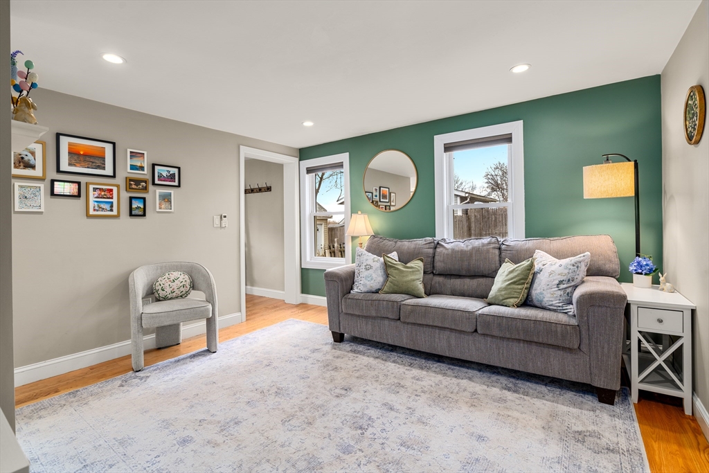 10 Cedar Street Hudson, MA 01749 - Photo 10 of 38 a living room with furniture and a window