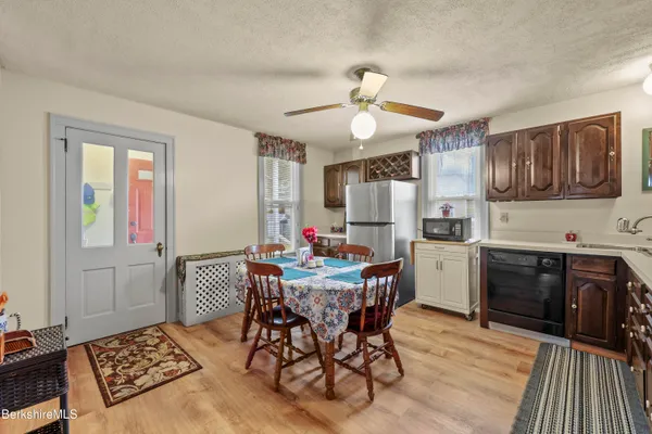 a view of a dining room with furniture