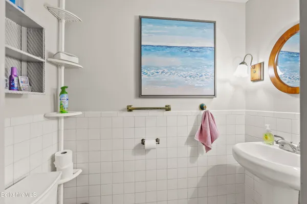 a bathroom with a bathtub and a sink