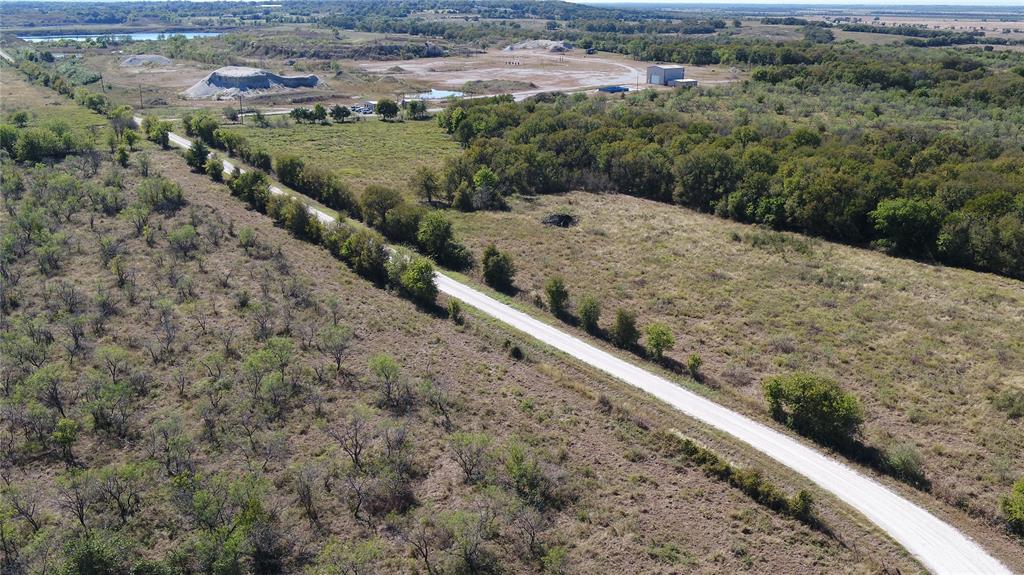 6 County Road Mexia, TX 76667 - Photo 7 of 33 a view of a dry yard with lots of trees