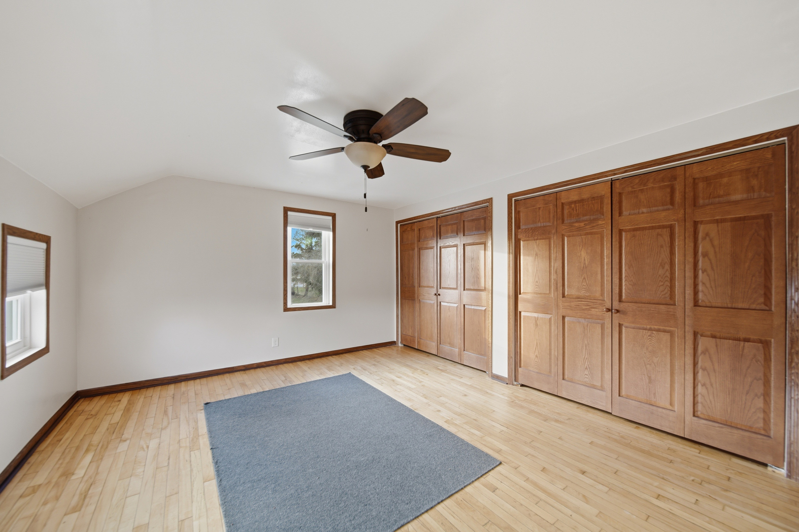 599 Palmyra Road Dixon, IL 61021 - Photo 14 of 34 a view of an empty room with wooden floor and a window