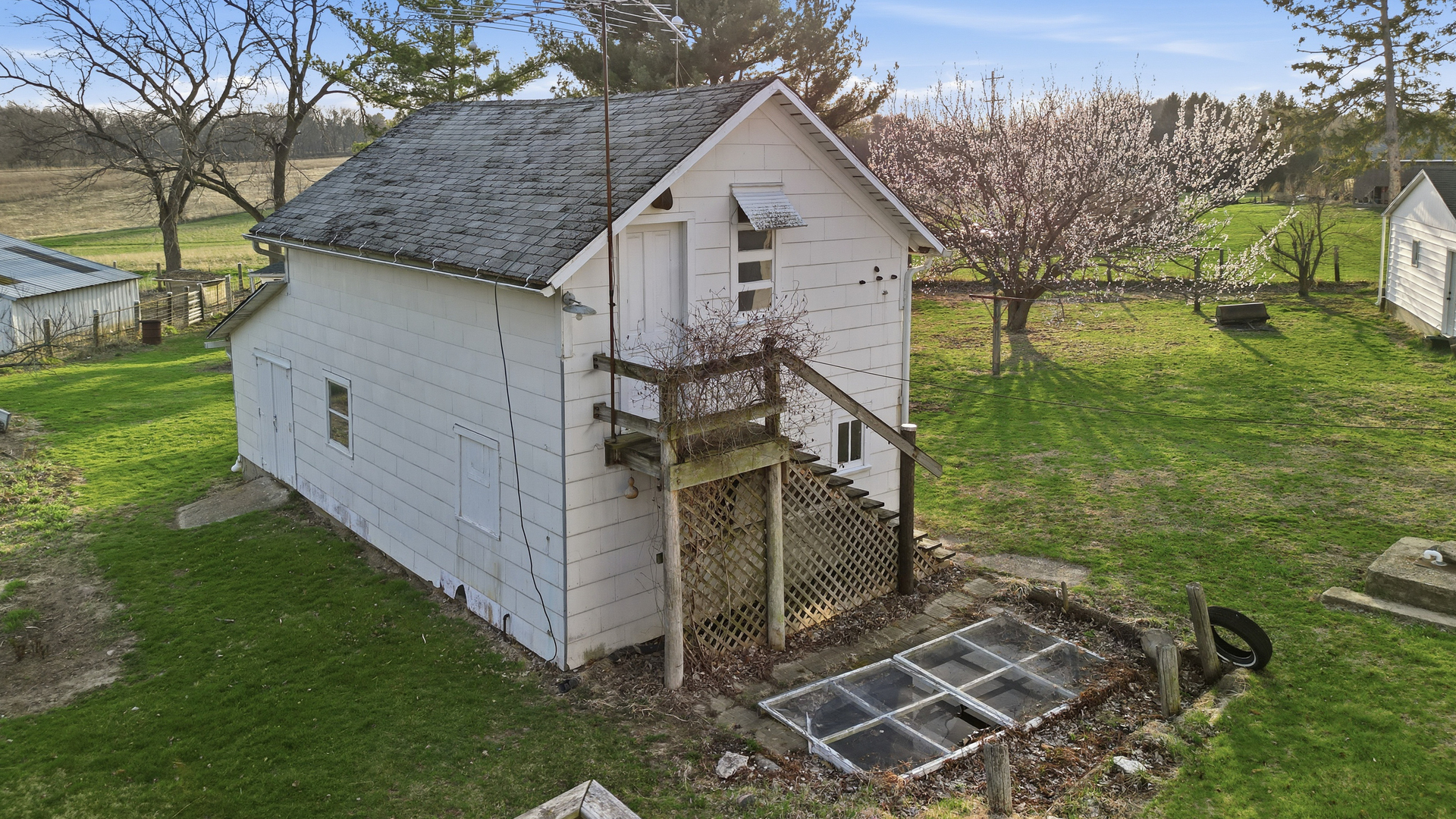 599 Palmyra Road Dixon, IL 61021 - Photo 26 of 34 a view of a house with a yard