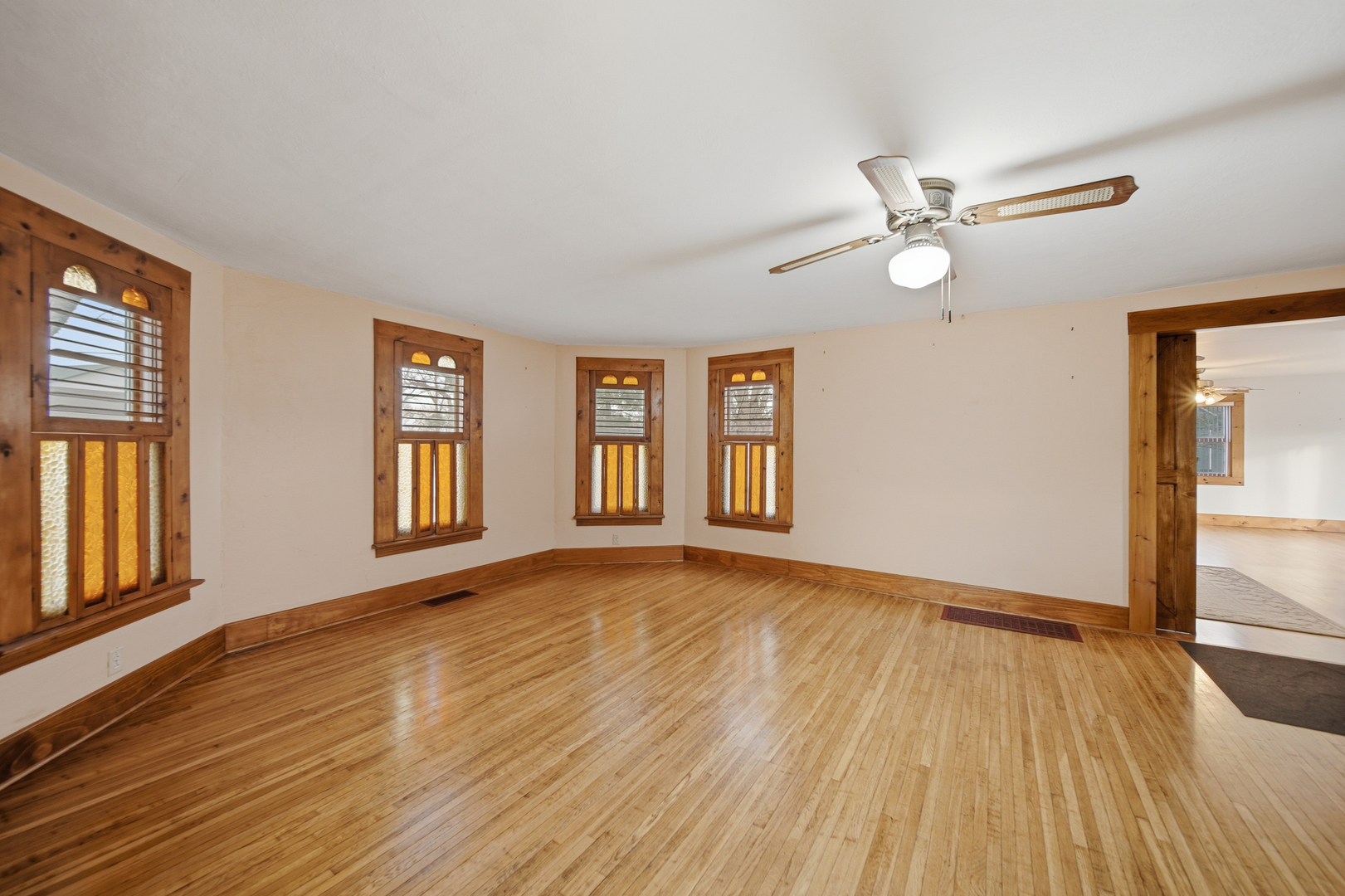 599 Palmyra Road Dixon, IL 61021 - Photo 7 of 34 a view of empty room with wooden floor and fan