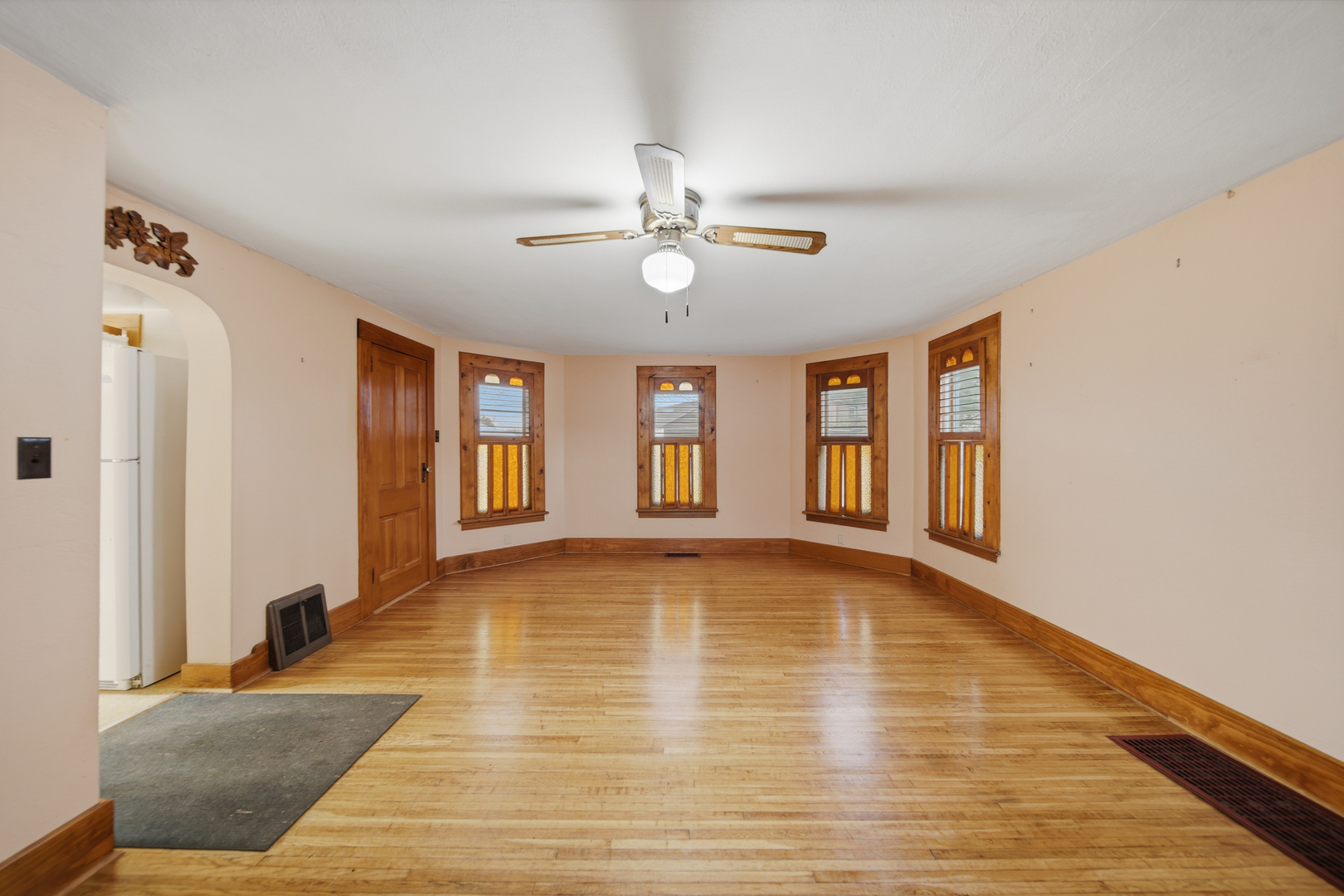 599 Palmyra Road Dixon, IL 61021 - Photo 8 of 34 a view of an empty room with window and wooden floor