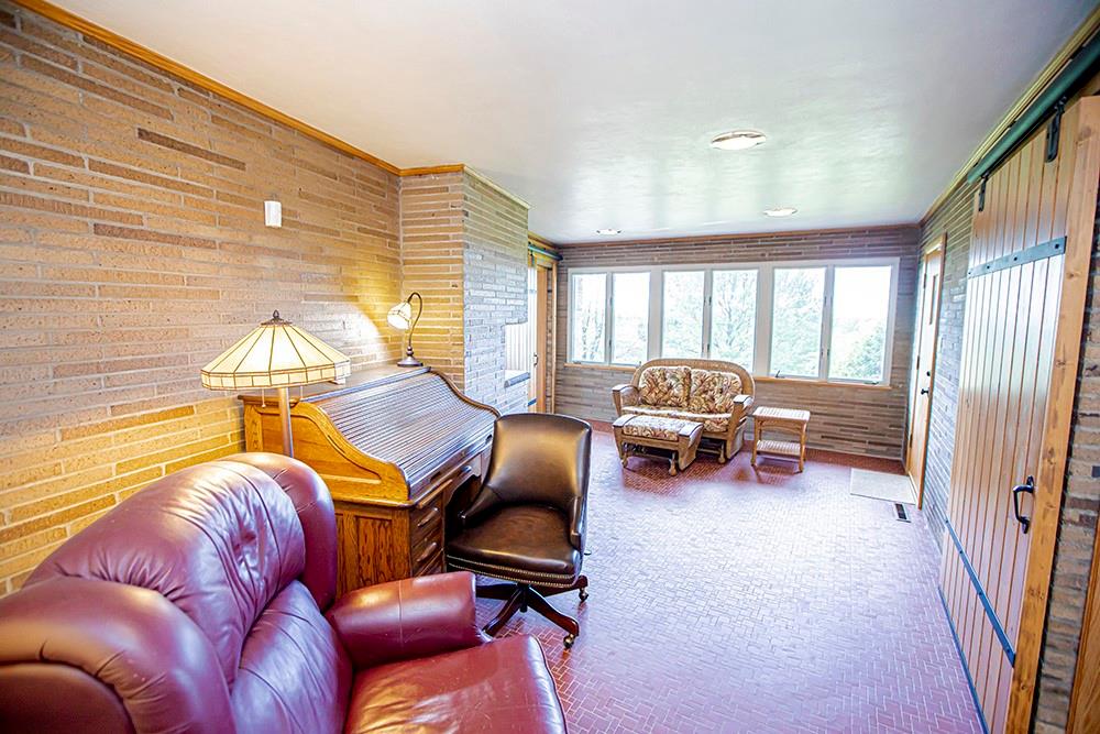 131 East Airport Road Butler, PA 16002 - Photo 11 of 25 a living room with furniture and a large window