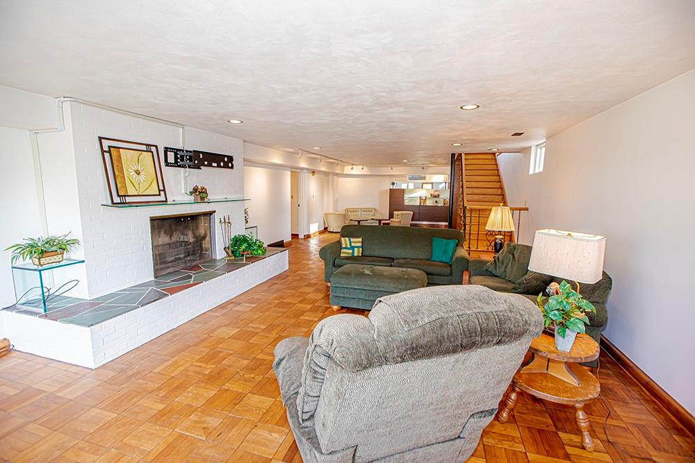 131 East Airport Road Butler, PA 16002 - Photo 13 of 25 a living room with furniture and a fireplace