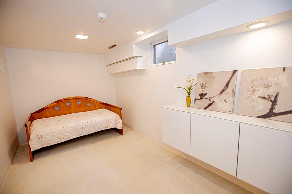 131 East Airport Road Butler, PA 16002 - Photo 20 of 25 a bedroom with a bed and wall painting