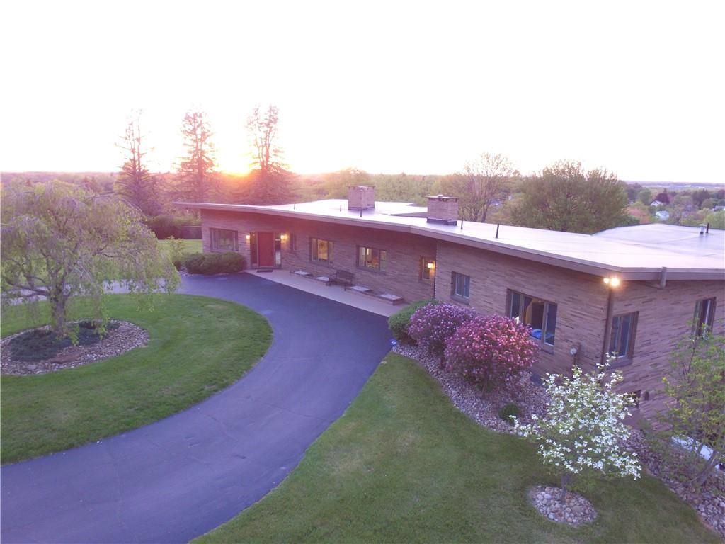 131 East Airport Road Butler, PA 16002 - Photo 24 of 25 a view of a house with a yard and potted plants