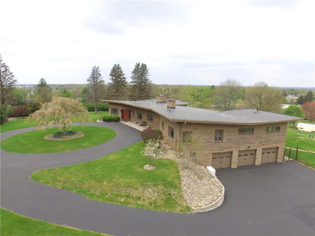131 East Airport Road Butler, PA 16002 - Photo 25 of 25 an aerial view of a house with a yard table and chairs