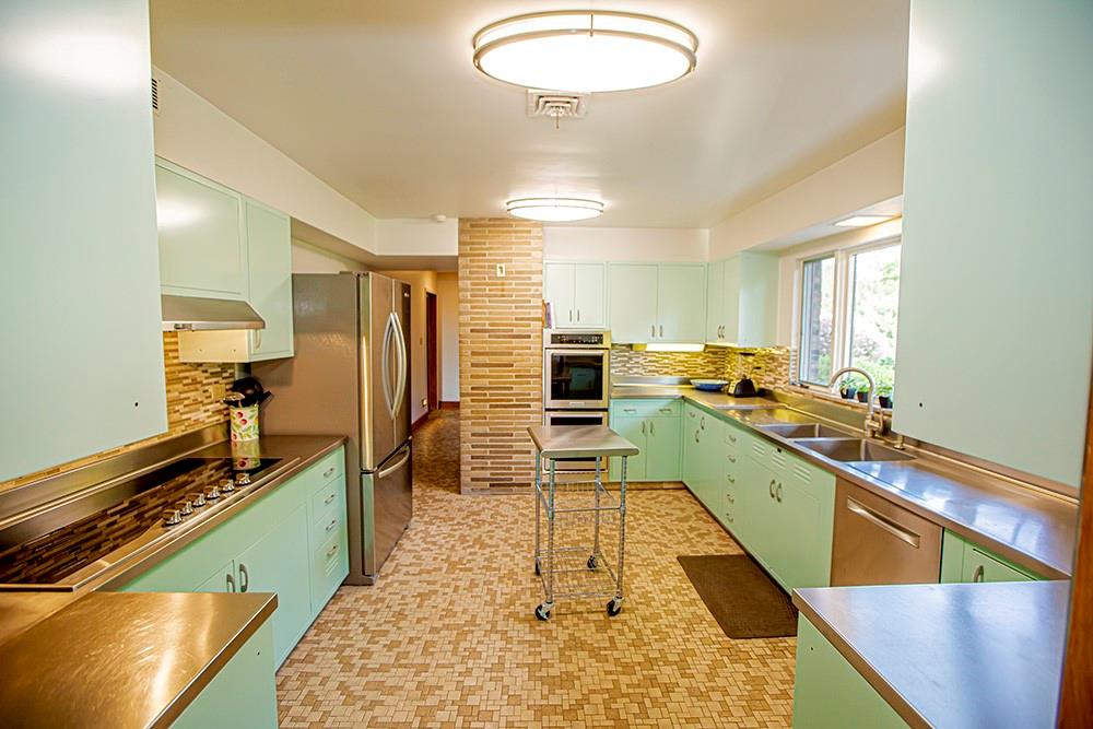 131 East Airport Road Butler, PA 16002 - Photo 8 of 25 a large kitchen with lots of counter space and stainless steel appliances