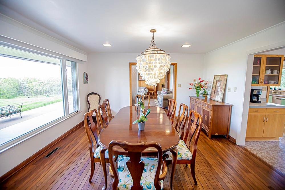131 East Airport Road Butler, PA 16002 - Photo 10 of 25 a view of a dining room with furniture window and wooden floor