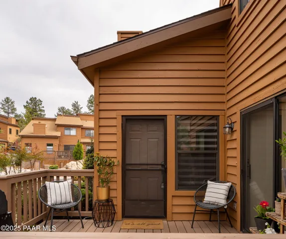 a front view of a house with glass windows