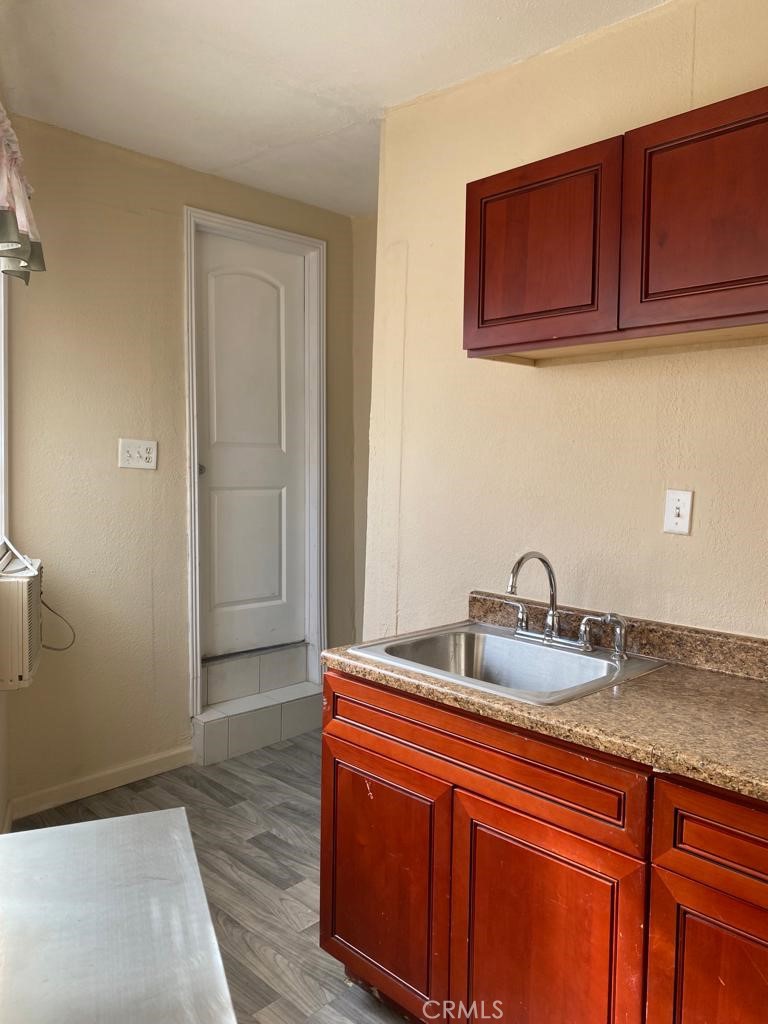 5751 Bridgehead Road, Unit 38 Oakley, CA 94561 - Photo 15 of 17 a kitchen with stainless steel appliances granite countertop a sink and cabinets