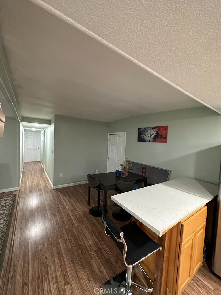 5751 Bridgehead Road, Unit 38 Oakley, CA 94561 - Photo 4 of 17 a view of a dining room with furniture and wooden floor