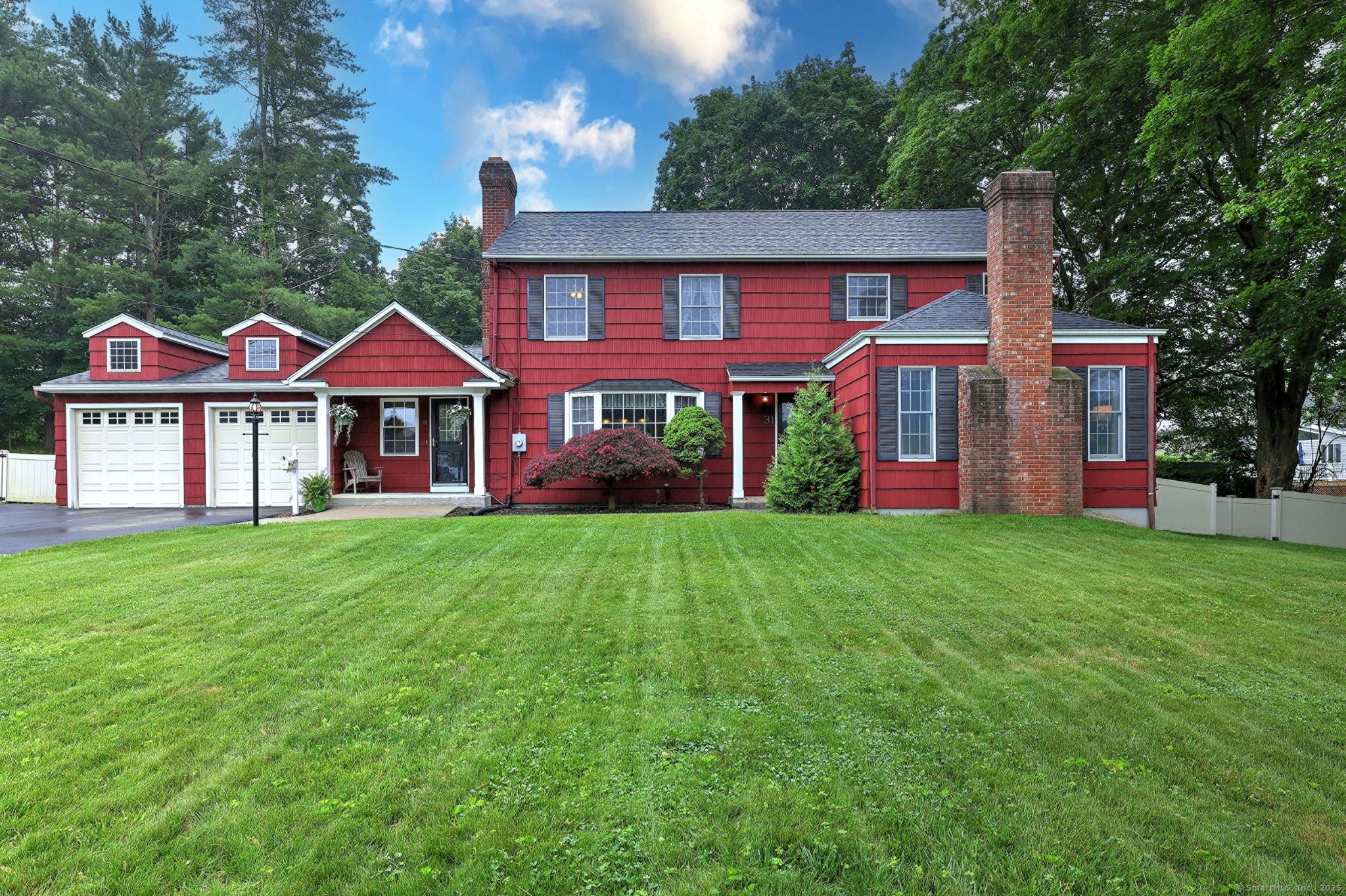 31 Meadowview Drive Trumbull, CT 06611 - Photo 1 of 1 a front view of a house with a yard