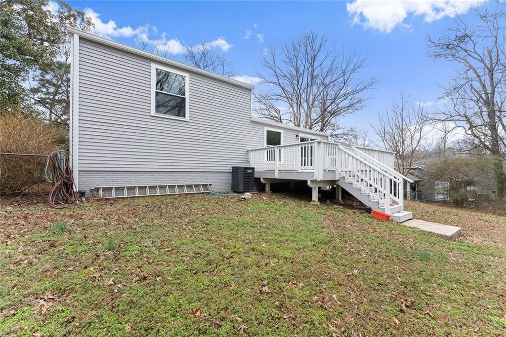 3467 Centerville Lane Southwest Snellville, GA 30039 - Photo 37 of 44 a view of a house with a yard