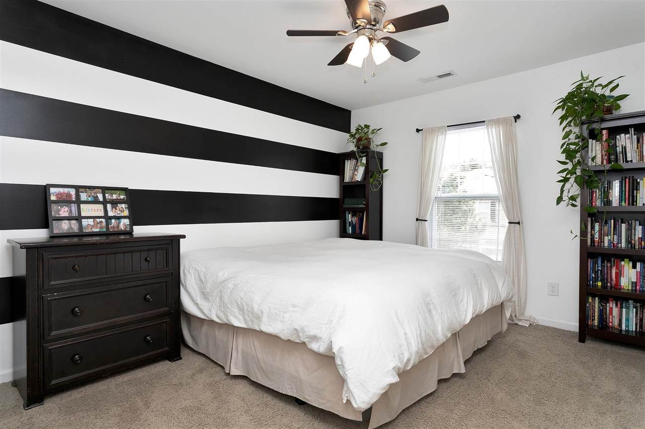 2408 Memory Ridge Drive Raleigh, NC 27606 - Photo 22 of 30 Bedroom with ceiling fan and large closet