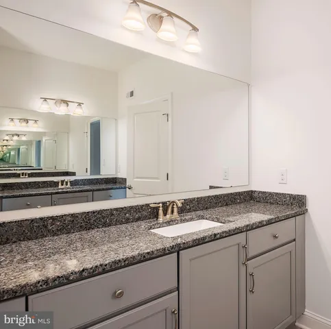 a bathroom with a shower and toilet