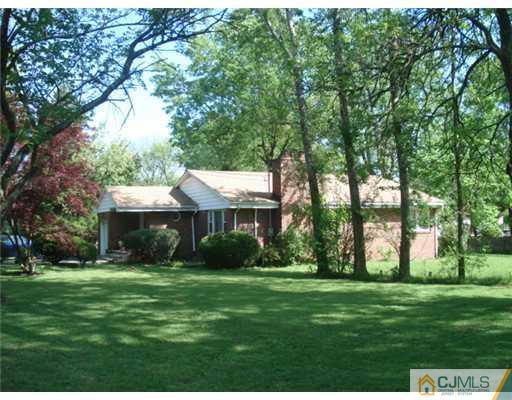 2031 Oak Tree Road Edison, NJ 08820 - Photo 12 of 12 a view of house with backyard