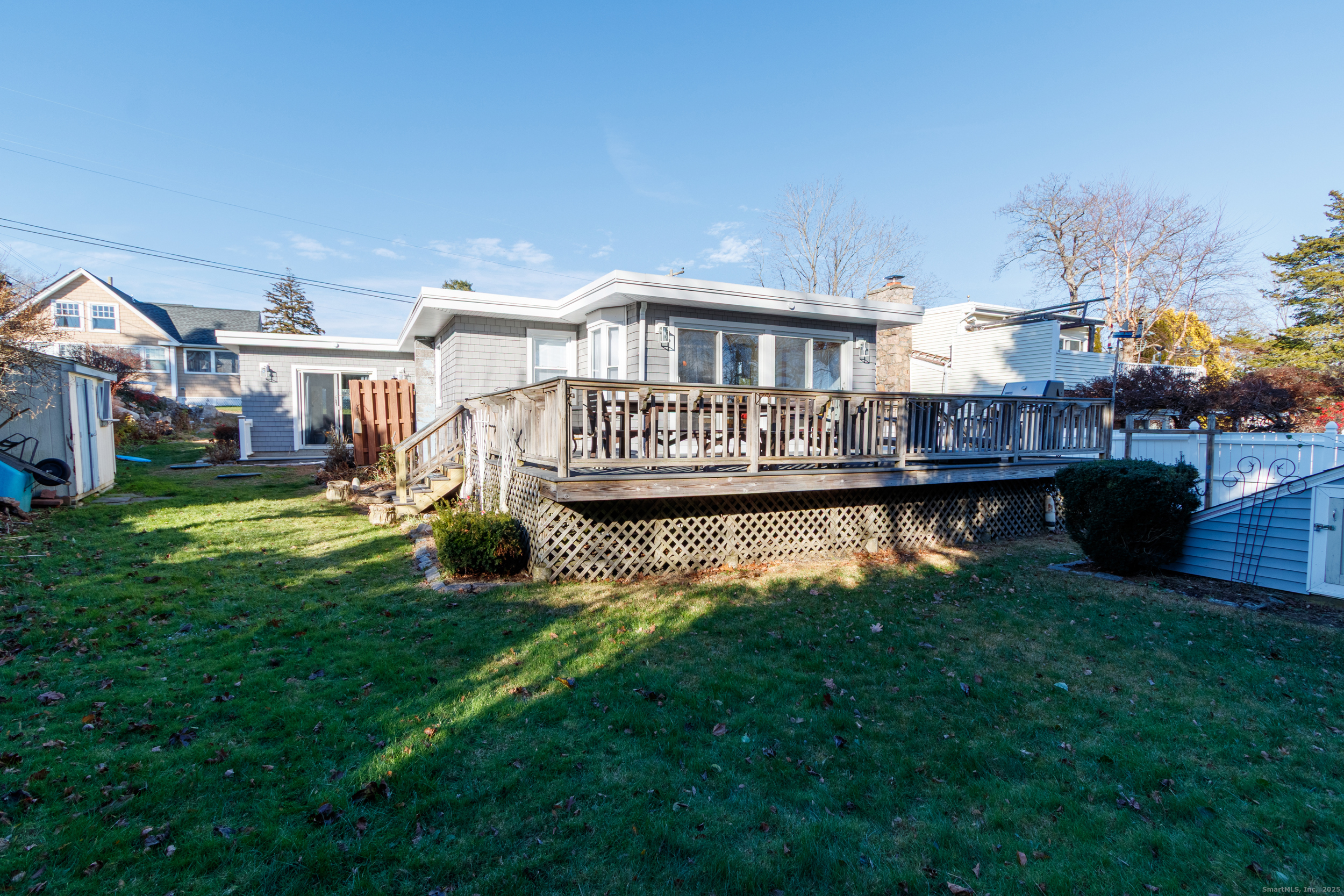 18 Bay Street Guilford, CT 06437 - Photo 28 of 34 a view of a house with a swimming pool