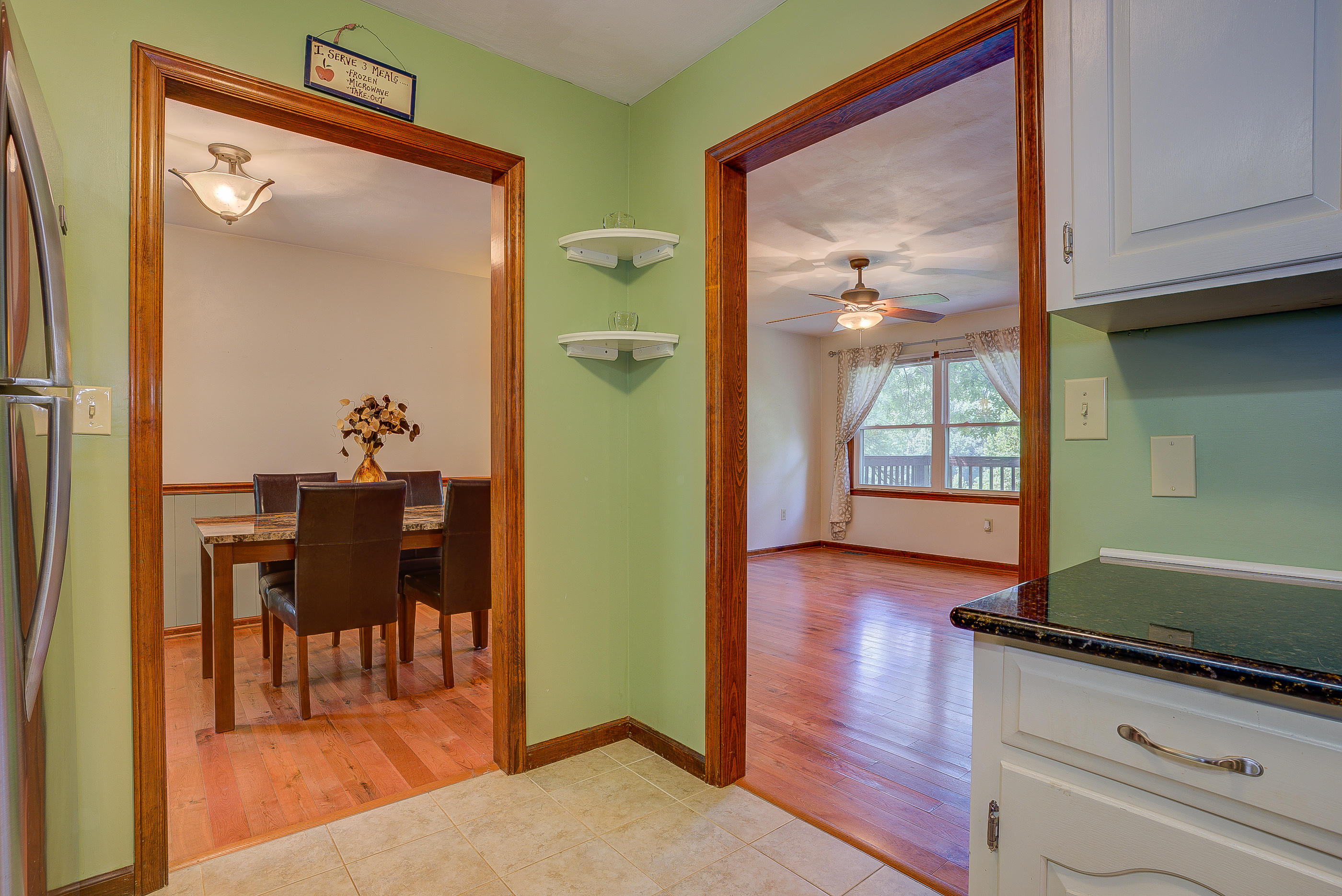 1405 Bore Auger Road Blue Ridge, VA 24064 - Photo 11 of 22 a view of kitchen with furniture and wooden floor