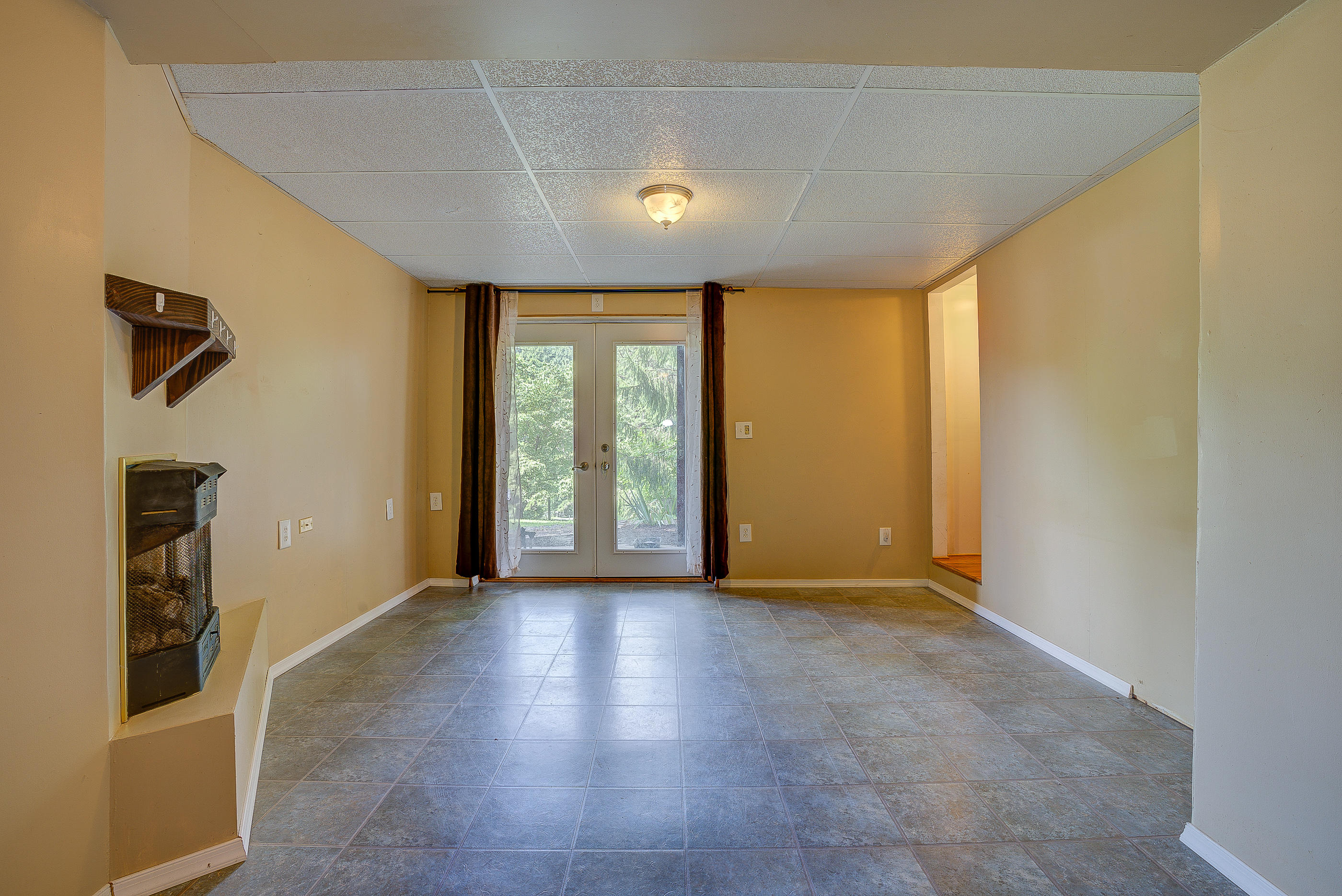 1405 Bore Auger Road Blue Ridge, VA 24064 - Photo 19 of 22 a view of an empty room with a window