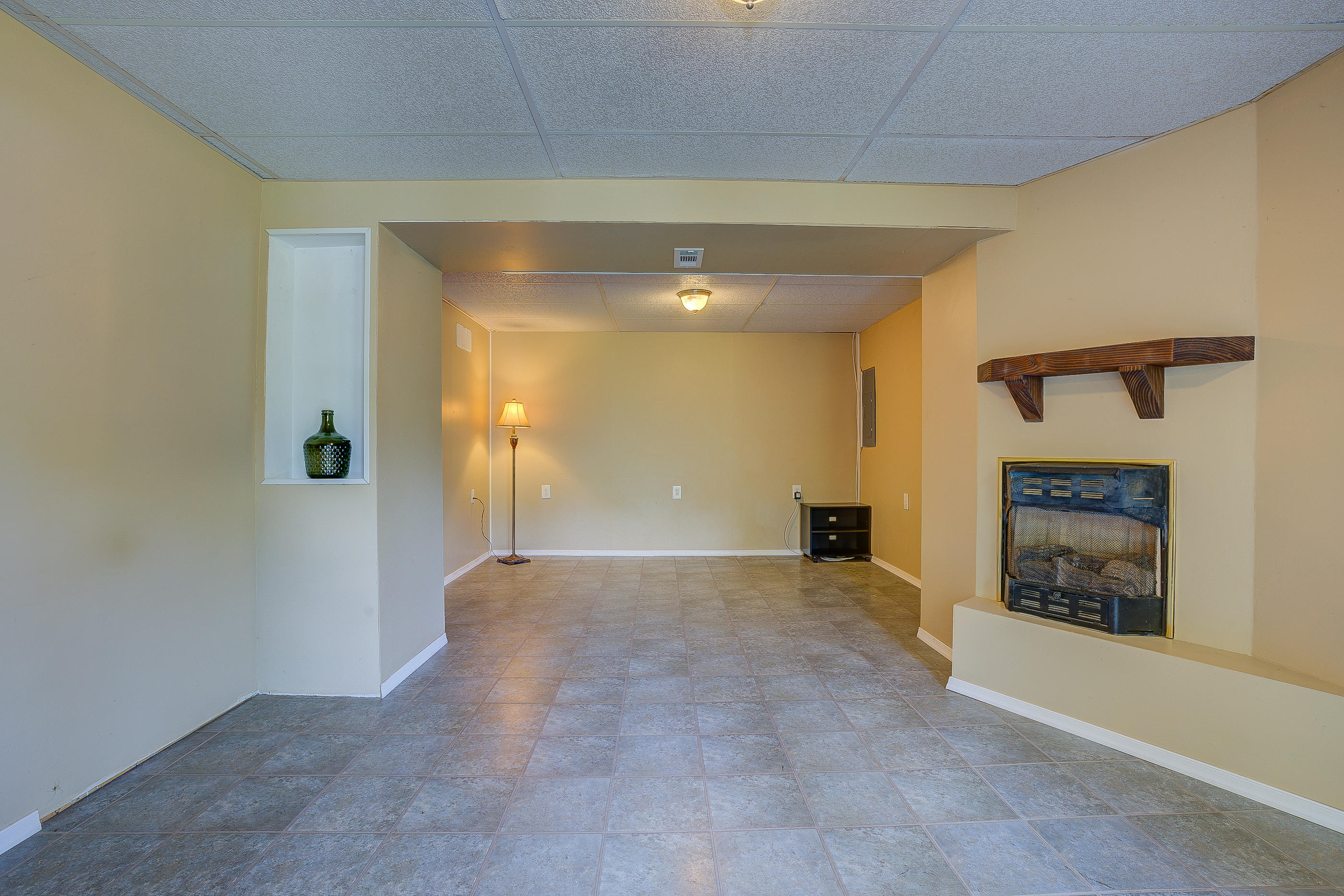 1405 Bore Auger Road Blue Ridge, VA 24064 - Photo 20 of 22 a view of an empty room with a fireplace