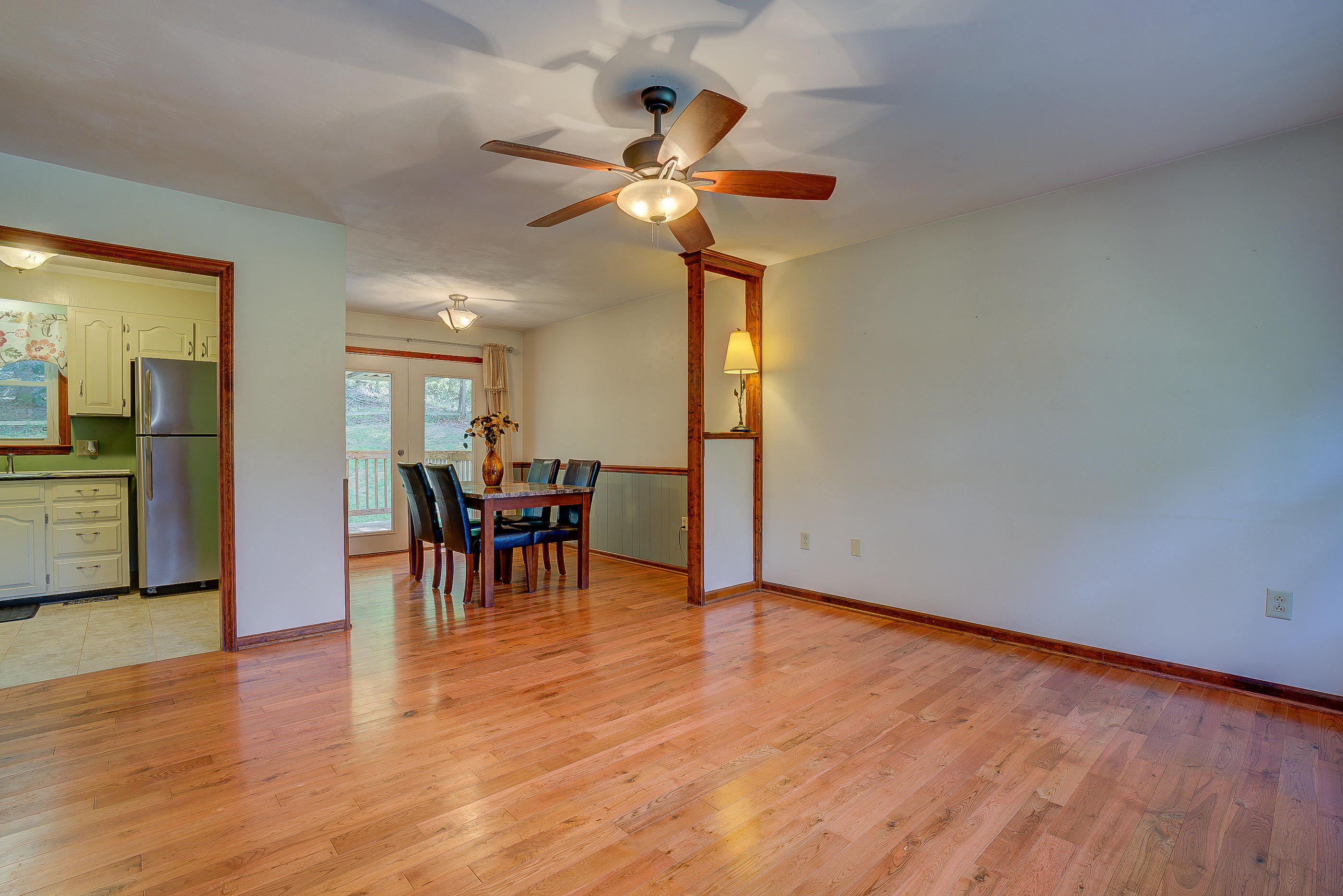 1405 Bore Auger Road Blue Ridge, VA 24064 - Photo 7 of 22 a view of a dining room with furniture and chandelier