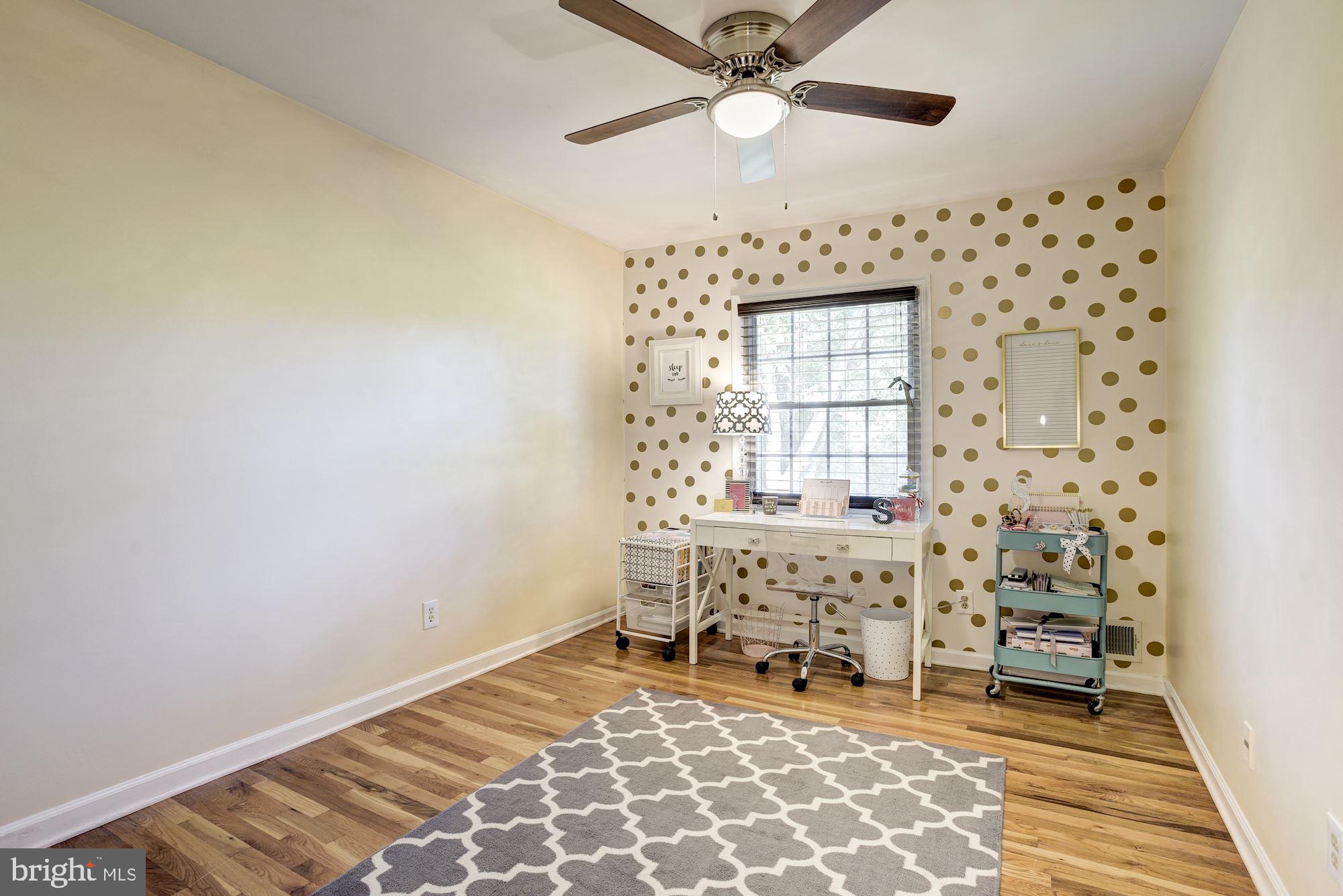 1851 Wainwright Drive Reston, VA 20190 - Photo 17 of 26 a view of a bedroom with furniture and windows