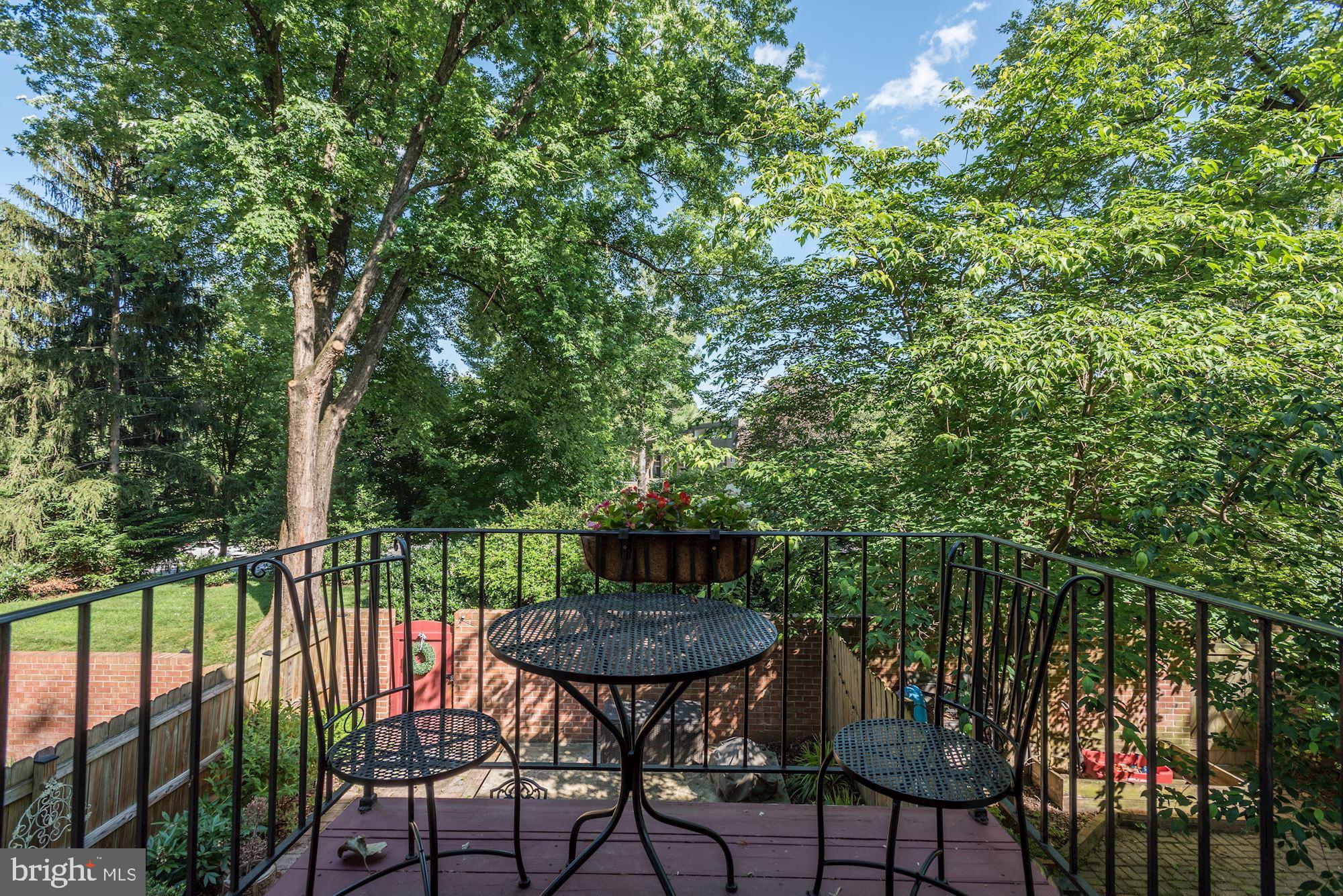 1851 Wainwright Drive Reston, VA 20190 - Photo 22 of 26 a view of a chairs and table in the back yard